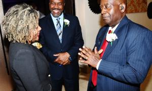 Senator the Hon. Dr. Dana Morris Dixon, Minister of Education, Skills, Youth and Information, exchanges pleasantries with Mr. Clayton Hall (centre) the Jamaica Teachers' Association's Deputy Secretary General responsible for Member Services and Industrial Relations and Mr. Doran Dixon, Assistant Secretary General for Property and Business Services.